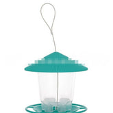Hanging bird feeder with automatic seed dispenser